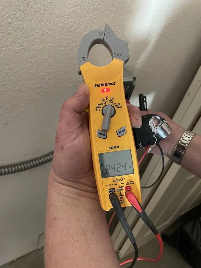 Voltage testing with clamp meter during Hot Tub / Pool Electrical Wiring in Minden
